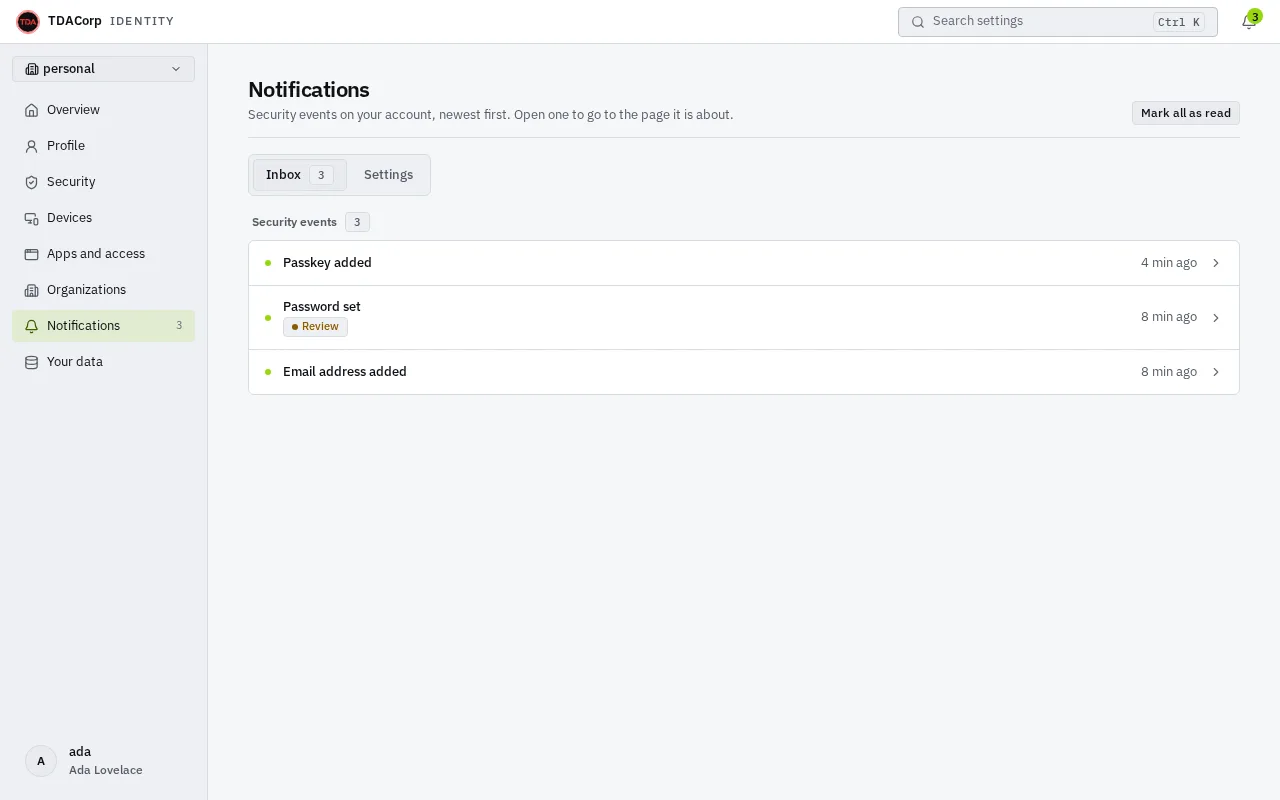 The Notifications inbox listing three unread security events: a passkey added, a password set that is flagged to review, and an email address added.