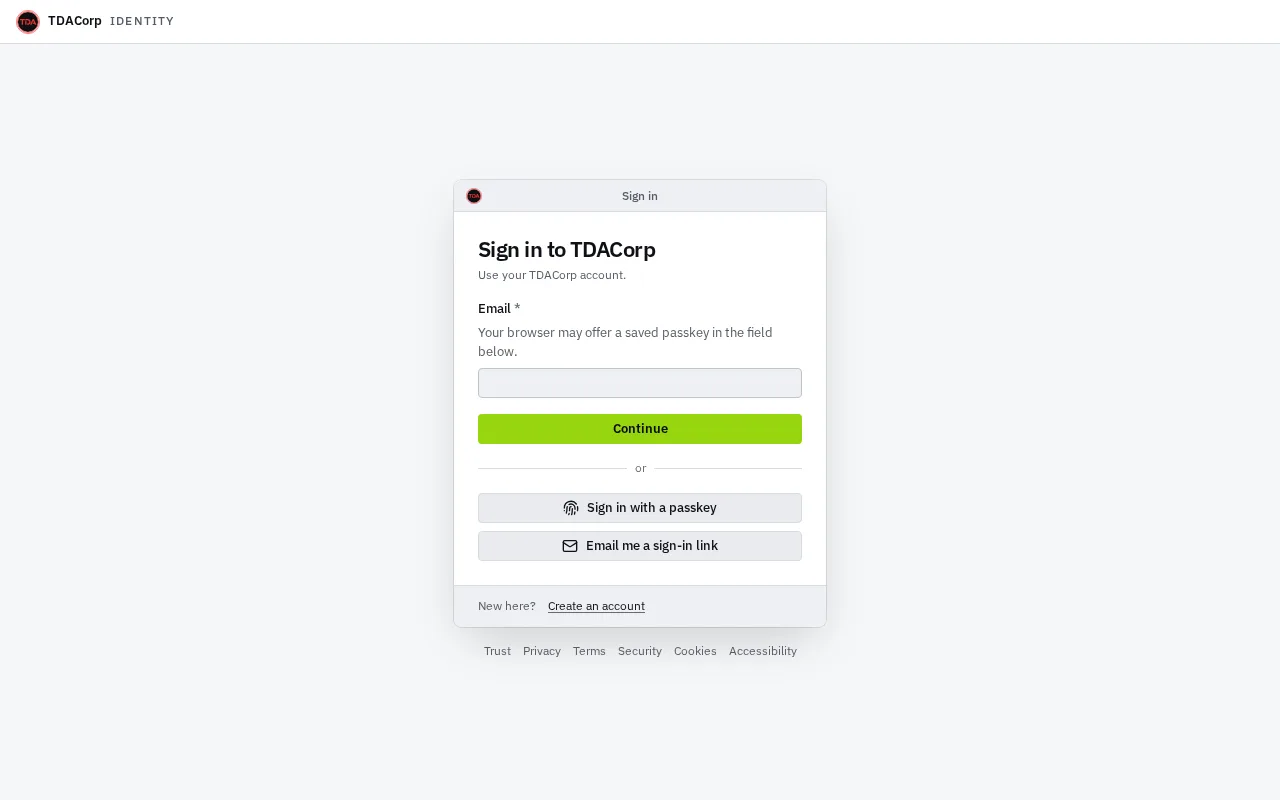 The sign-in page: an email field, a Continue button, and below them the options to sign in with a passkey or to be emailed a sign-in link.